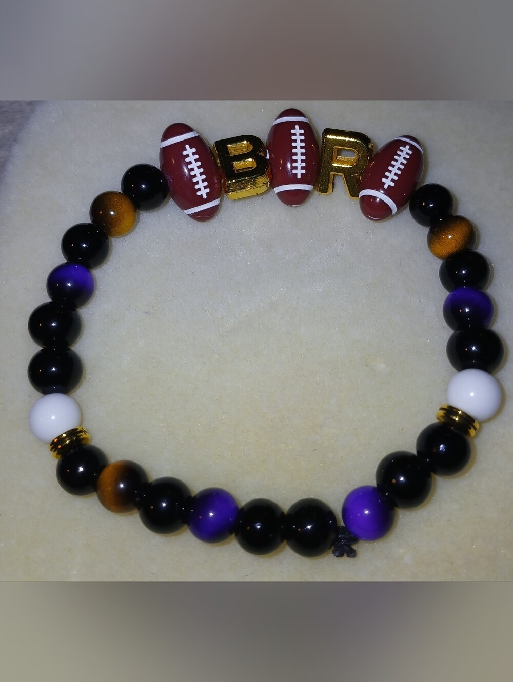 NWT Handcrafted Unisex Football Bead Stretch Bracelet in Purple, Black & Yellow.